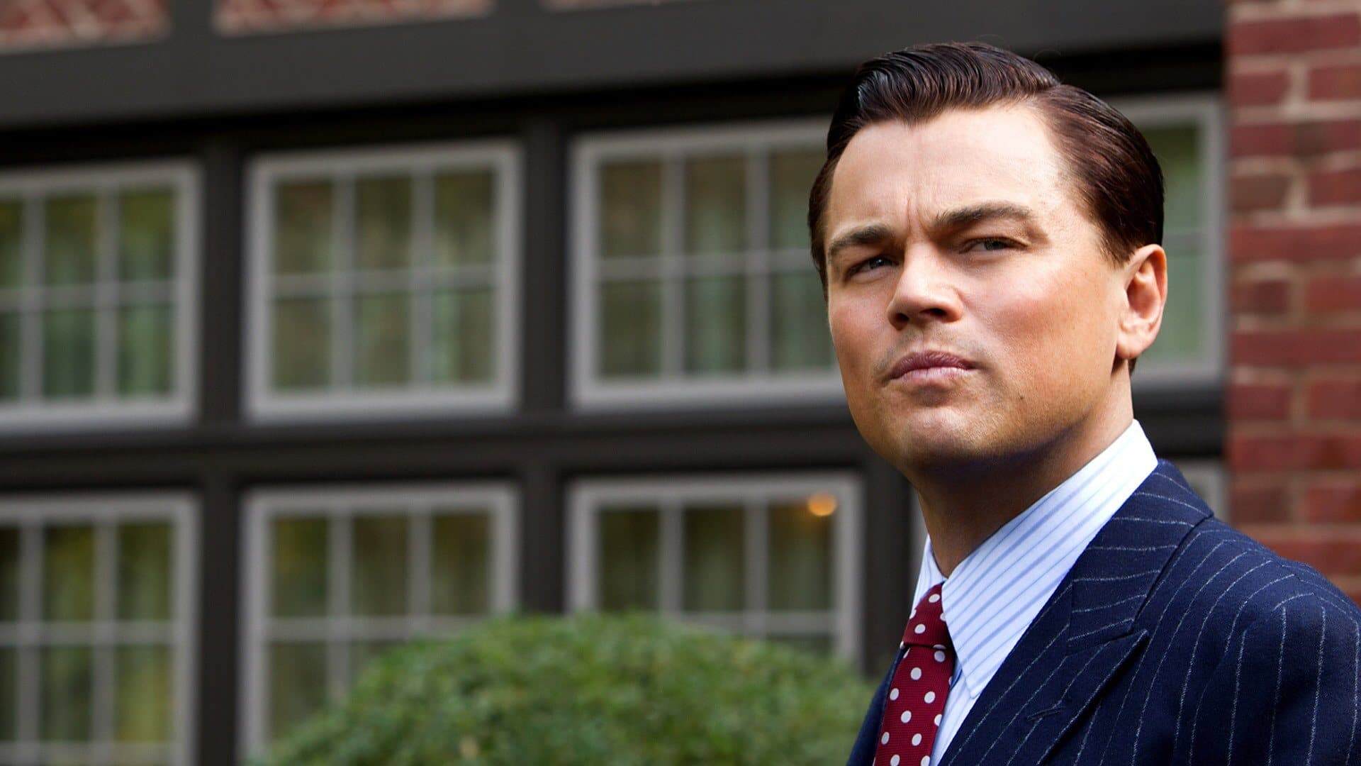 Leonardo DiCaprio as Jordan Belfort facing the consequences of his rise
