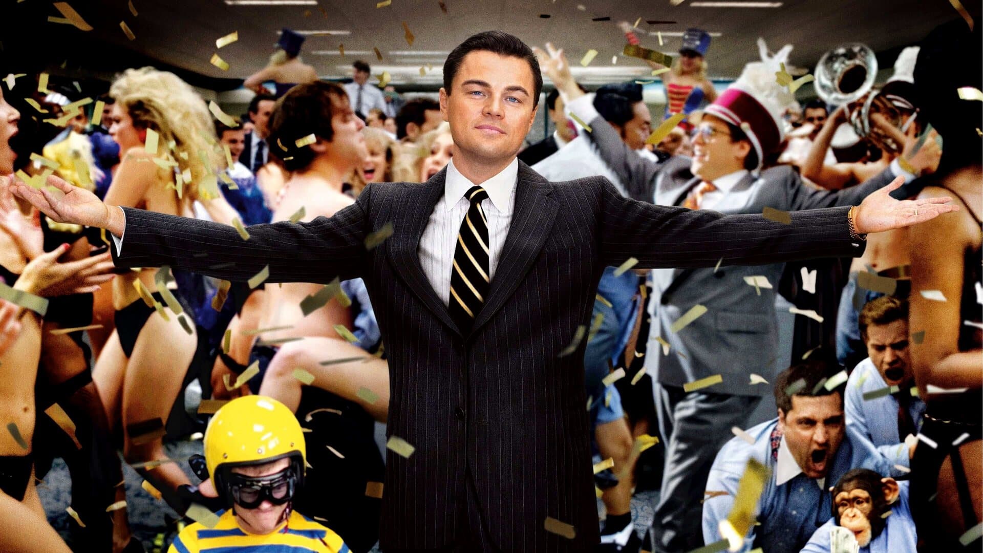 Leonardo DiCaprio as Jordan Belfort standing before the chaotic Stratton Oakmont office