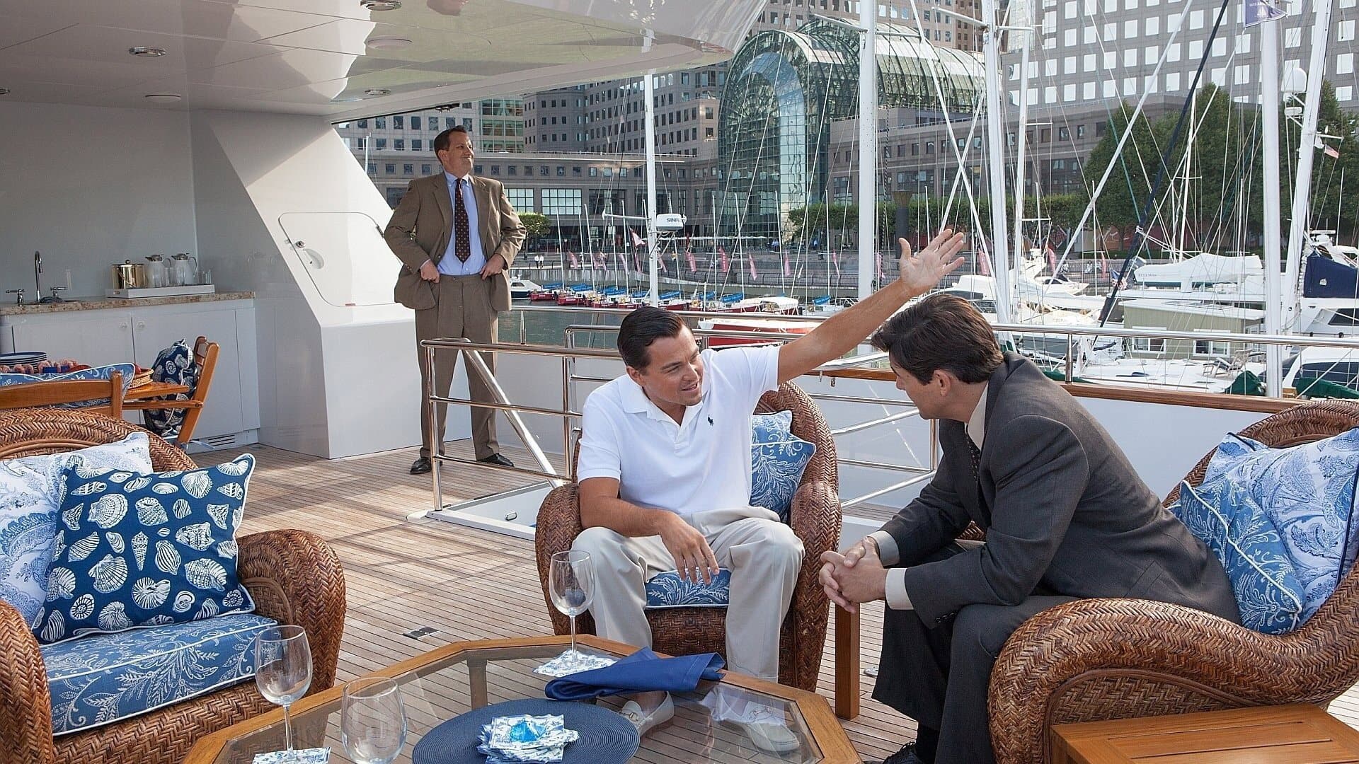 Jordan Belfort aboard a luxury yacht in The Wolf of Wall Street